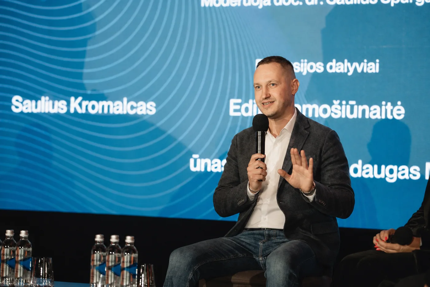 Saulius Kromalcas speaking on a professional panel
